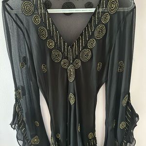 NWOT Beautiful black sequence top with flattering sleeves one size fits all